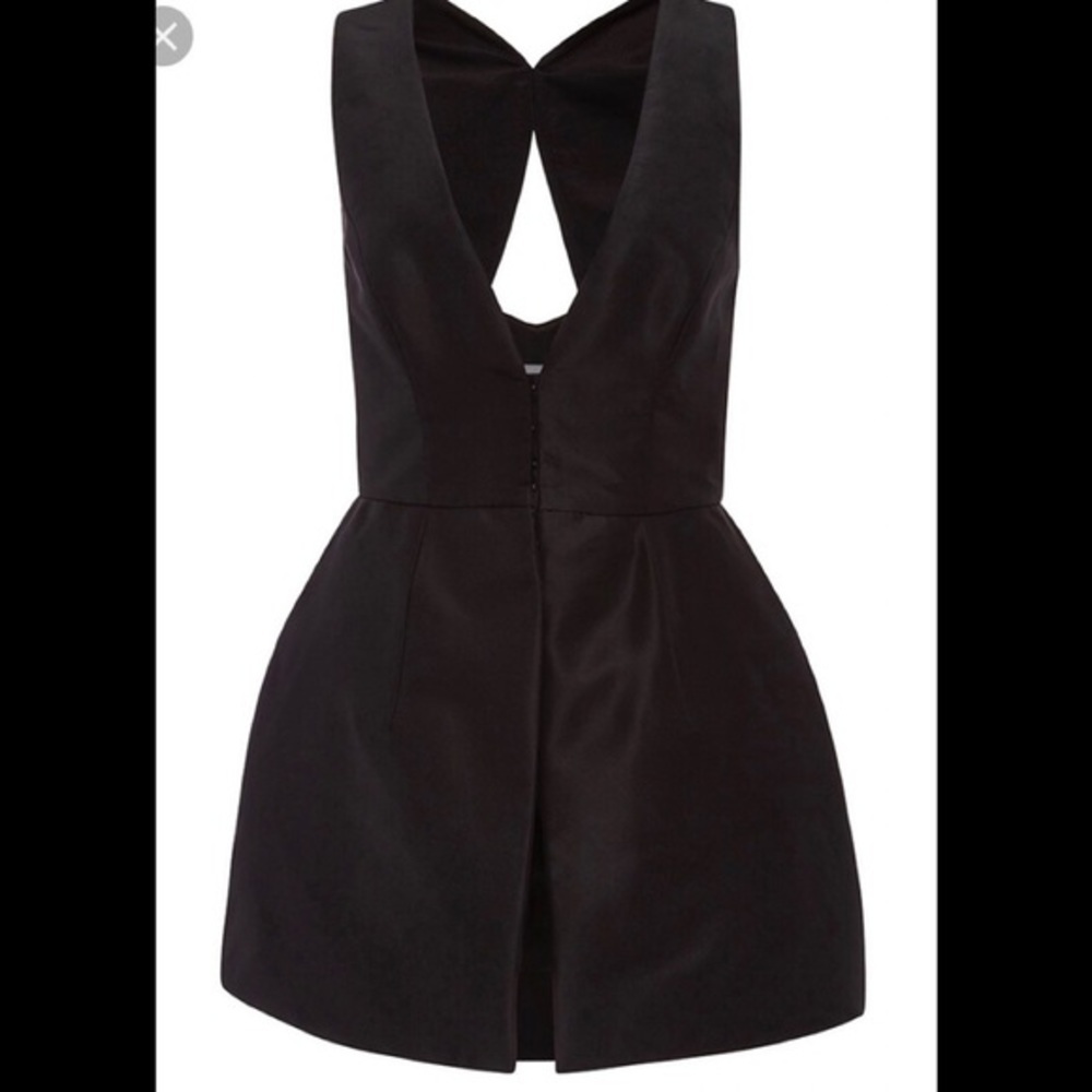 𝅺Monique Lhuillier silk peplum vest S/M
